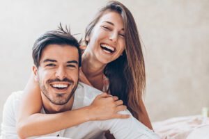 young couple smiling